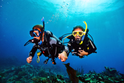 Photo of First dive Discover scuba diving with an instructeur underwateur