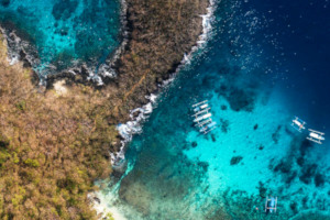 Aerial view of blue lagoon snorkeling and dive site in Padang Bai