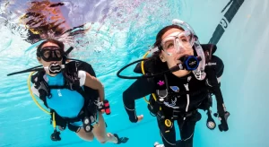 Scuba diver in swimming pool-practice for PADI courses