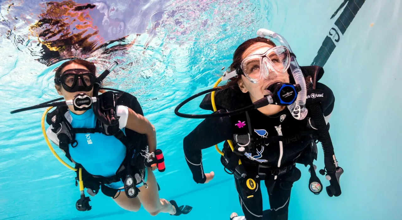 Scuba diver in swimming pool-practice for PADI courses