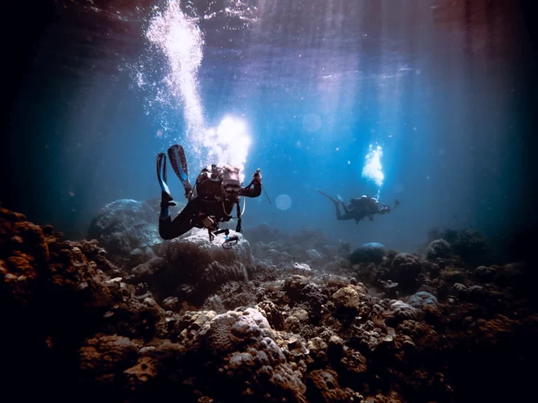 Diver in shallow water in Amed dive site lipah bay